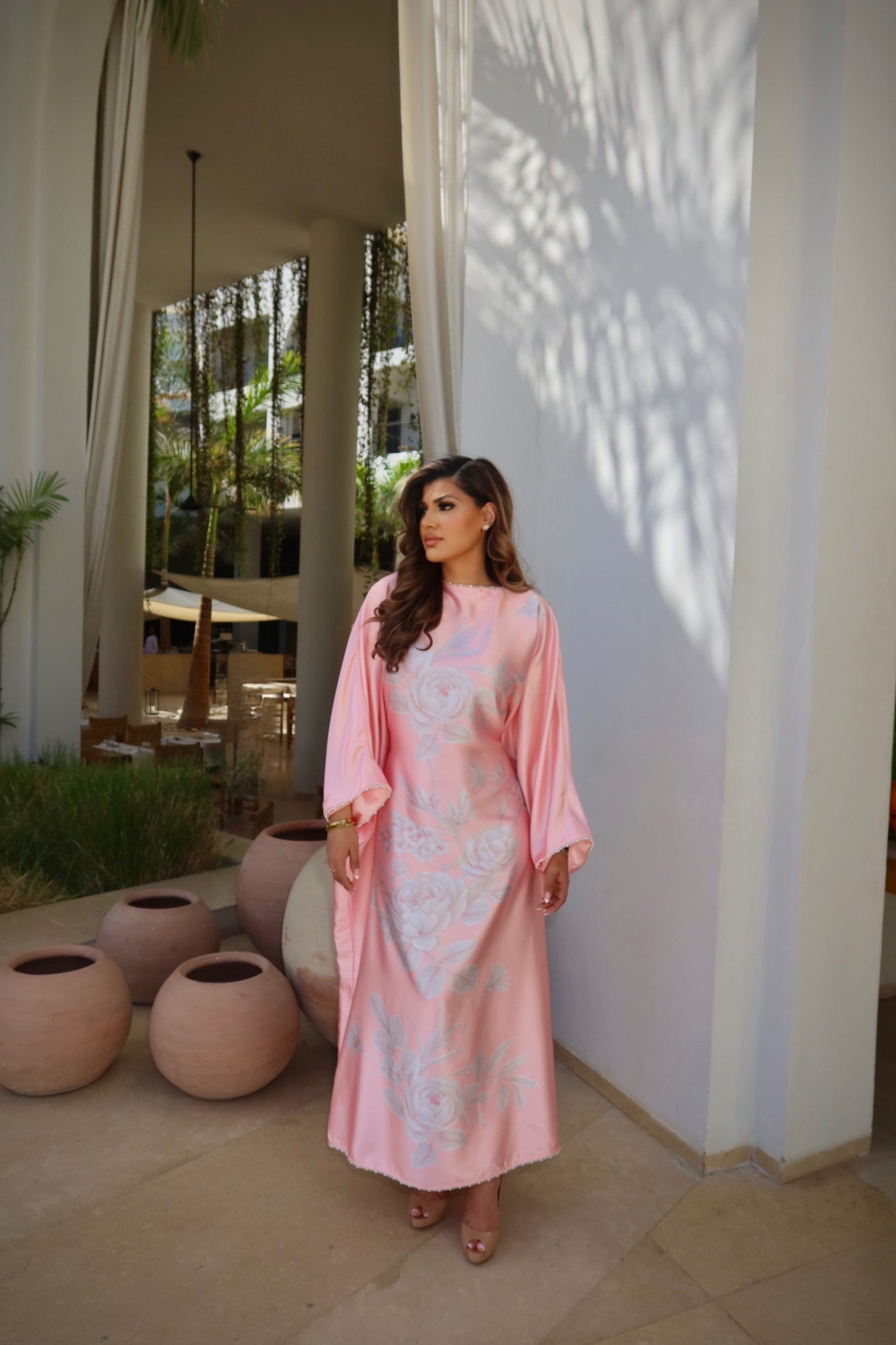 Aveline modest pink satin kaftan dress with pearl trim and waist belt.