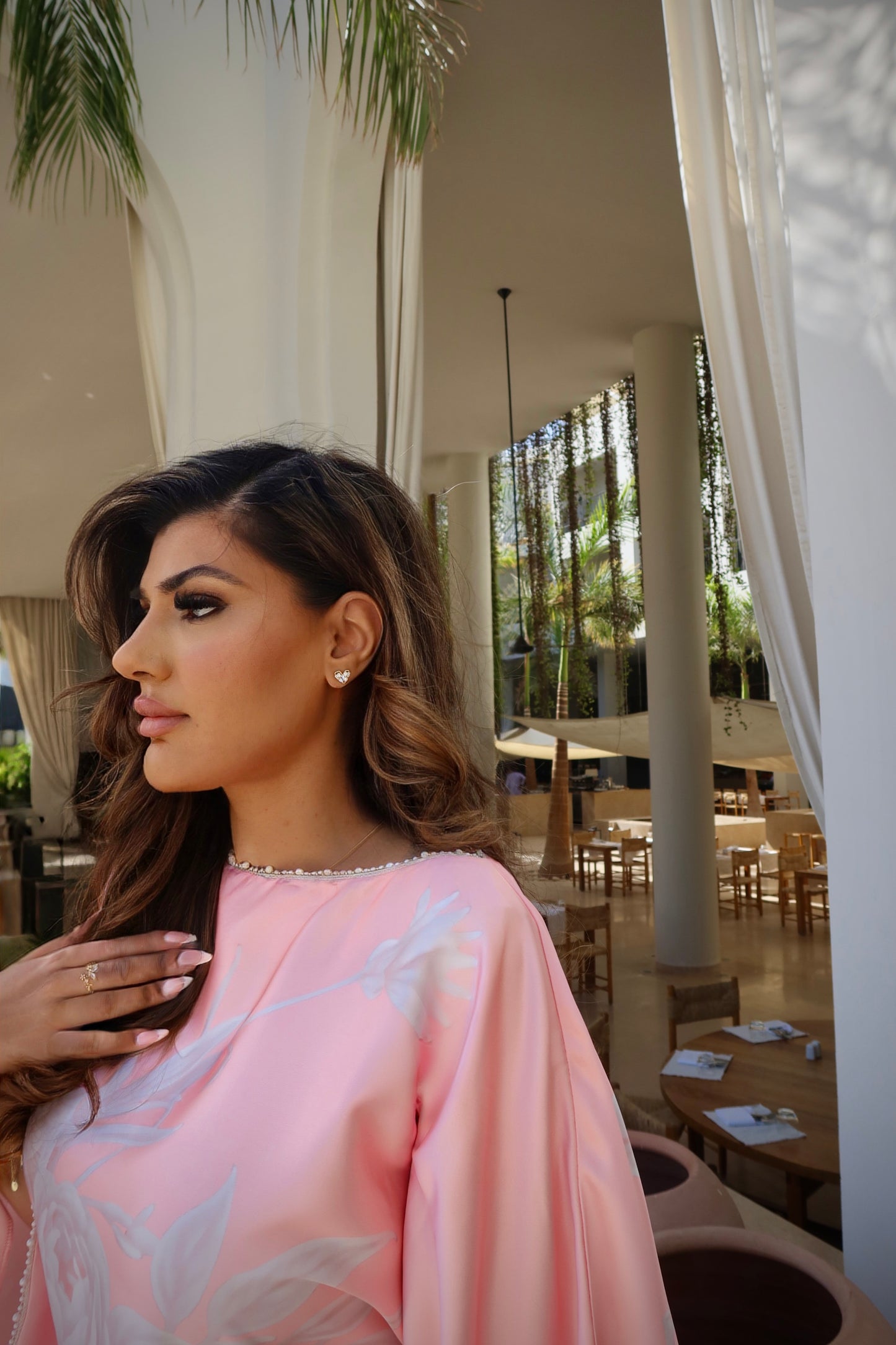 Aveline pearl trim neckline detail on pink satin modest kaftan.